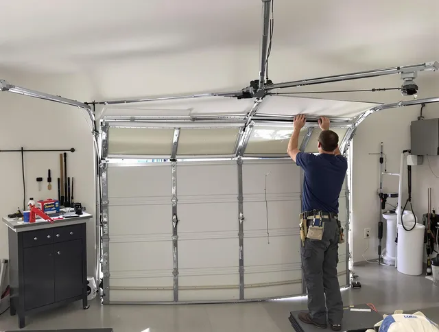 Weston Garage Door Repair specialist performing precise section replacement on Weston garage door