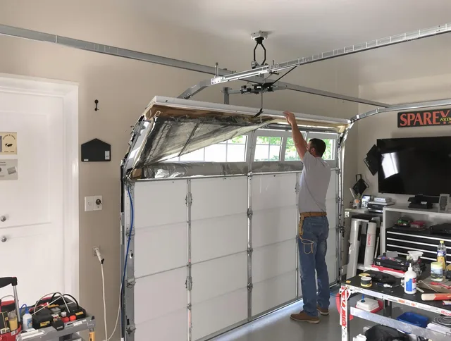 Garage door section replacement by Weston Garage Door Repair in Weston