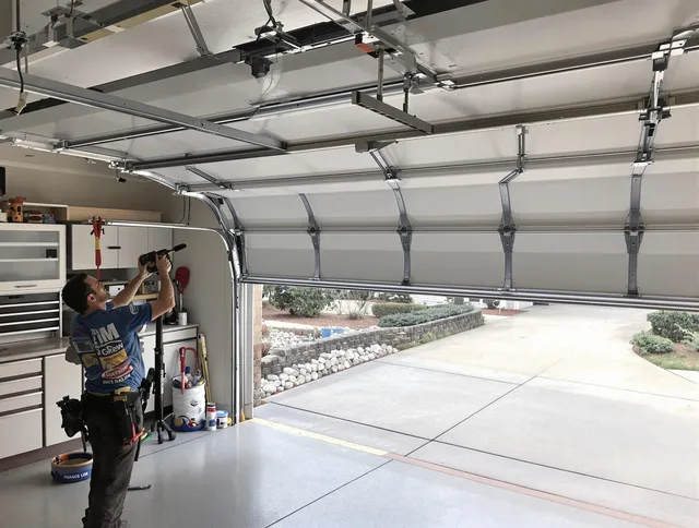 Garage door track repair service by Weston Garage Door Repair in Weston